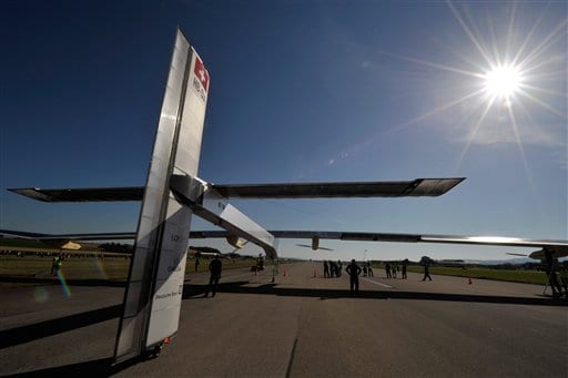 Pilot Andre Borschberg eased the Solar Impulse out of the clear blue morning sky onto the runway at Payerne airfield at 9 am on Thursday morning. (AP Photo)