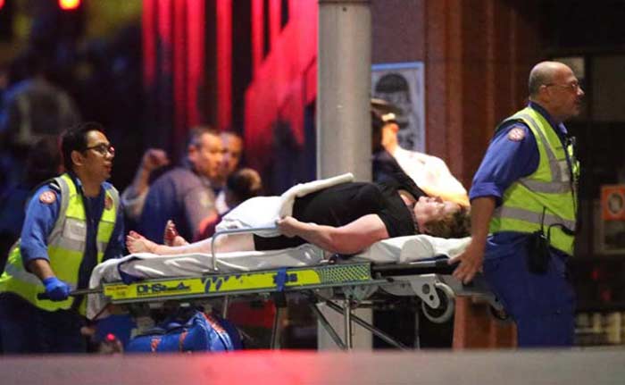 Paramedics rushed into the cafe, and brought some people out on stretchers. More details continue to emerge from the site.