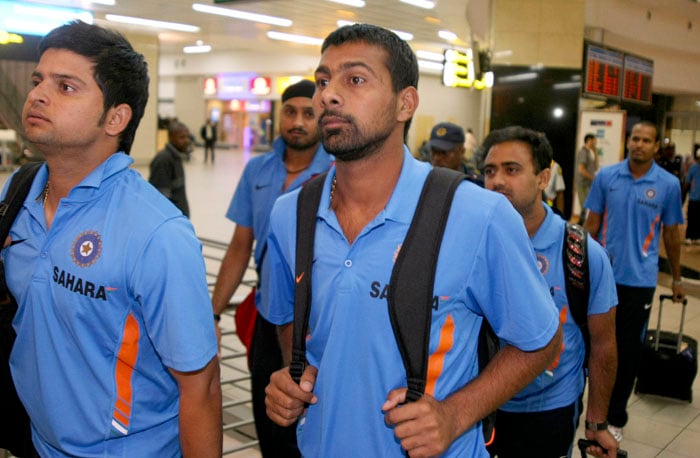 India's team arrive at the OR Tambo international airport in Johannesburg ahead of the Champions Trophy competition. India are placed in Group A along with Australia, Pakistan and West Indies (AP Photo)