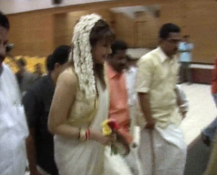 Sunanda Pushkar arrives at the reception hall on Monday.