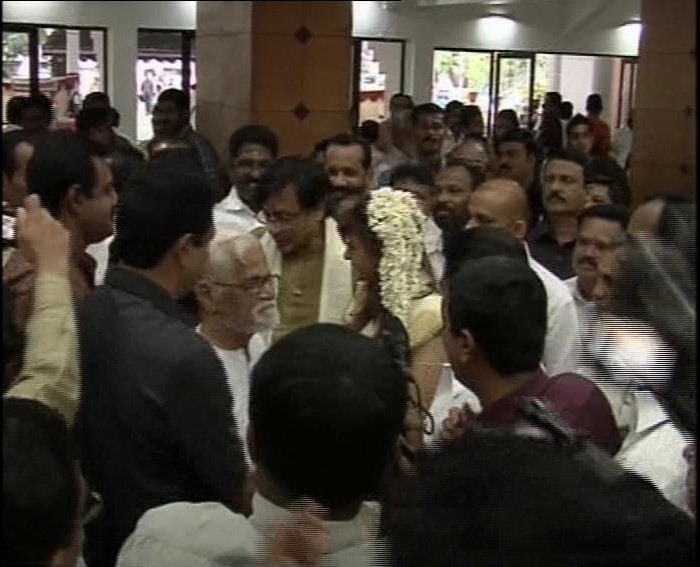 Sunanda and Tharoor surrounded by relatives at their reception.