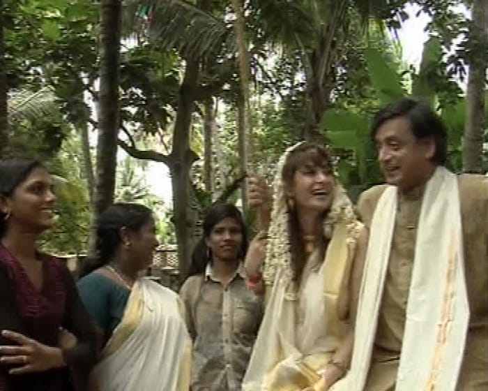 The couple enjoying among kids.