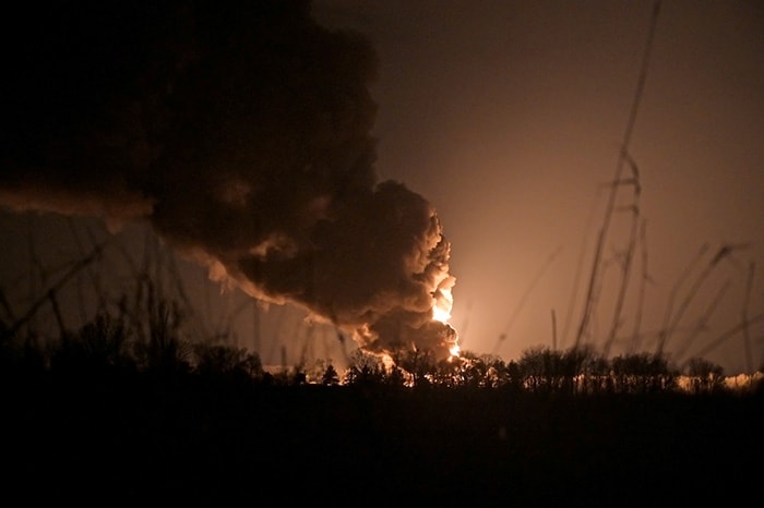 An oil depot, reportedly hit by shelling in Kyiv, burns on day 4 of the invasion.