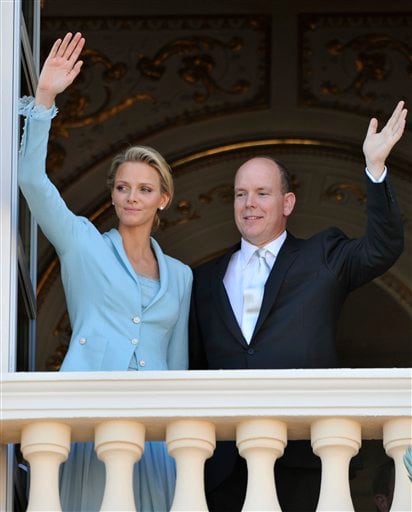 Prince Albert II of Monaco and Princess Charlene wave at their guests from the balcony of the prince's palace after the civil wedding marriage ceremony.(AP photo)