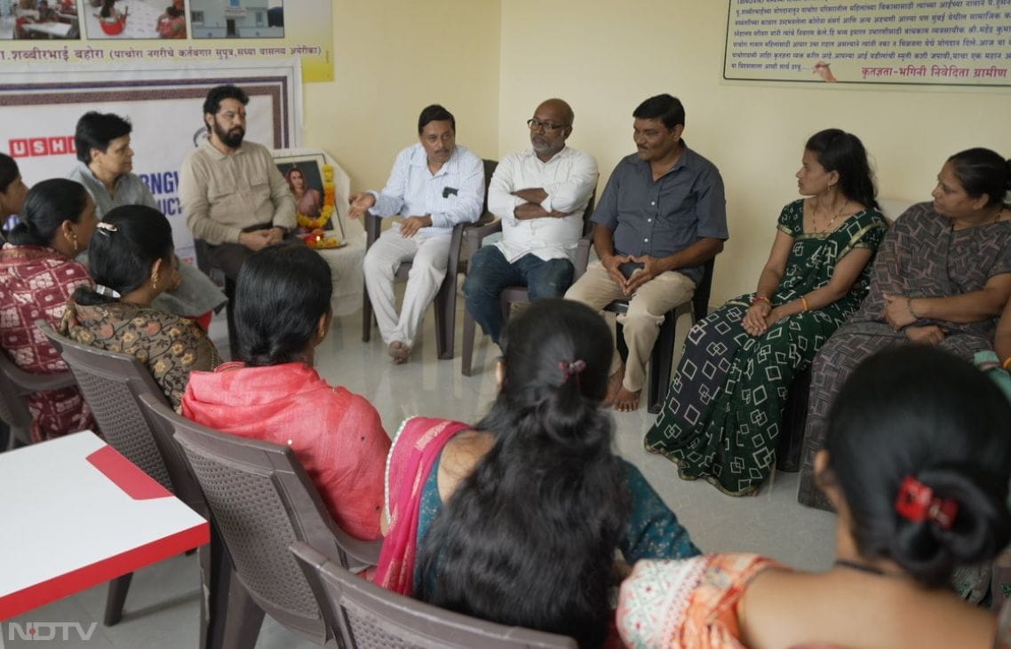 In Maharashtra's Pachora village, Jalgaon, women walk purposefully toward the Usha-BNGVN Training cum Production Centre, carrying fabric rolls under rural skies that reflect shifting traditions. Inside, founder Neelima Mishra observes trainees at sewing machines, where homemakers like Madhuri Amol Sonawane gain skills to earn from home, supporting families with two small children while dreaming of scaling from ?100 blouses to garment units, thanks to BNGVN's grassroots focus and Usha's industrial expertise.