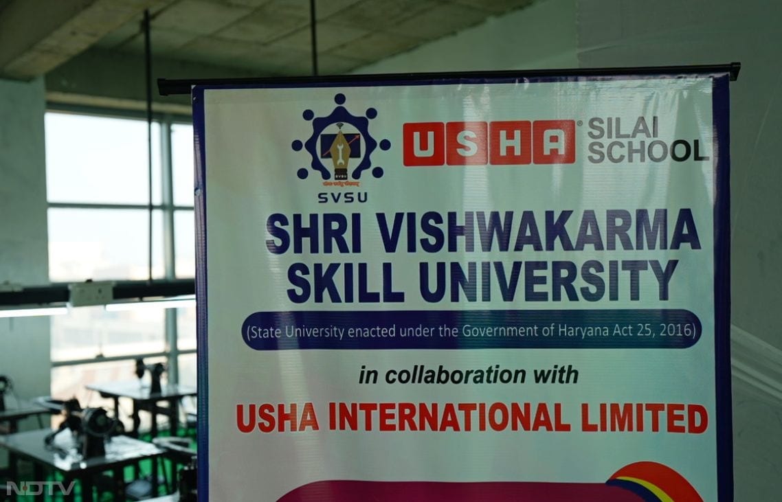 In Palwal, Haryana, at Shri Vishwakarma Skill University's Center of Excellence, rural women and girls from nearby villages engage in a 7-day intensive session on industry-grade Usha sewing machines under the Guru Shishya Kaushal Samman Yojana. Amid focused hands measuring fabric for seat covers and advanced garments, Prof. Dinesh Kumar, Vice Chancellor, observes the training that bridges academic skills to industry needs, equipping participants with techniques for self-employment or jobs, fostering independence in a pioneering skill-degree ecosystem.