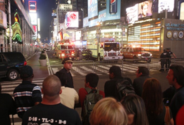 A suspicious vehicle in the heart of Times Square led the police to clear thousands of tourists and theatergoers from the area on a warm and busy evening of May 1. (NYT Photo)