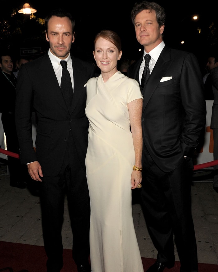 Colin Firth and Julianne Moore pose with director Tom Ford on the red carpet for <I>A Single Man</i>.