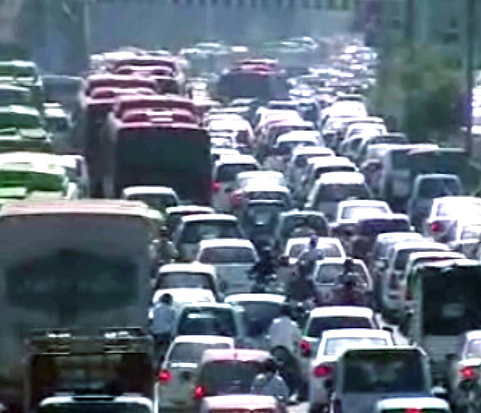 It was bumper-to-bumper traffic on the road leading from Games Village in east Delhi's Akshardham to various practice venues from morning and many people were seen stuck in their vehicles.