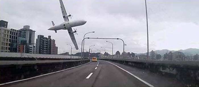 The flight clipped a bridge shortly after takeoff and crashed into a river in Taipei. At least 15 people have died.