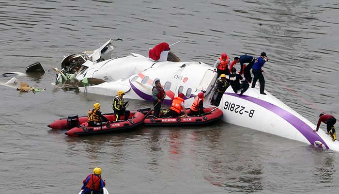 30 people remained unaccounted for. They were either still in the fuselage or had been pulled downriver, said an official. (AFP Photo)