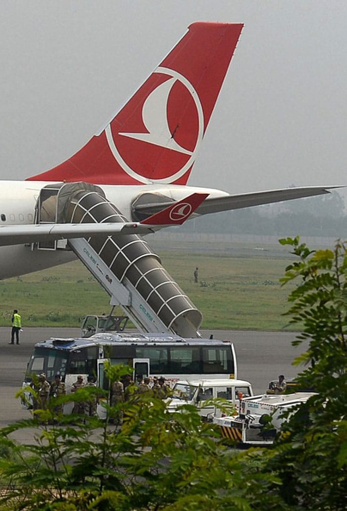 The plane, an Airbus 330, landed at 1.41 pm at the Delhi airport and was taken to an isolation bay. (AFP Photo)