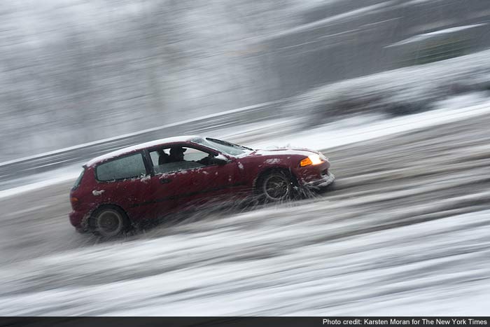 Police in New York's Suffolk County, some using snowmobiles, rescued hundreds of motorists stuck overnight on the Long Island Expressway.