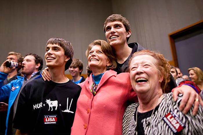 Senator Lisa Murkowski, center, the incumbent who lost the Republican primary in Alaska, was running as a write-in candidate.  Ms. Murkowski and her family reacted to early election returns in Anchorage. (NYT Photo)