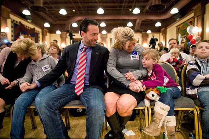 Joe Miller, the Republican Senate candidate in Alaska, with his family after his campaign.  He received hefty contributions from the Tea Party Express. (NYT Photo)