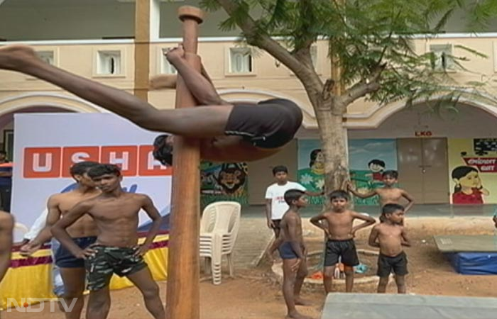 Performed over an eight and a half foot high pole and a rope hanging from a high mast separately. Mallakhamb is a sport that puts participant's agility and flexibility to a rigorous test.