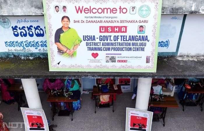 In Mulugu�district, Telangana, women from remote villages gather in a Usha Entrepreneurs Initiative training center, stitching school uniforms under the guidance of district administration and Usha coordinators. Focused hands operate machines on bulk orders, reflecting the partnership's impact as participants like Prashanthi learn advanced designs, earn from local needs, and support children's education, transforming dependency into household bargaining power and community stability.