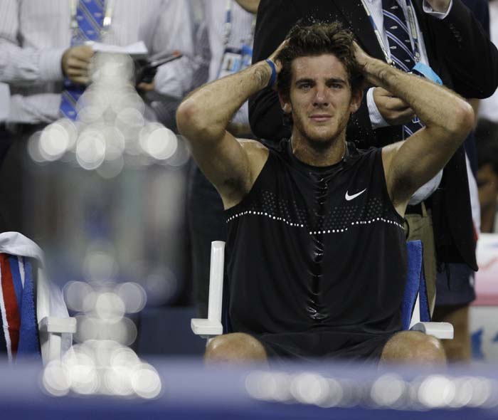 Juan Martin del Potro, of Argentina, waits for trophy presentations after winning the men's finals championship over Roger Federer, of Switzerland, at the U.S. Open tennis tournament in New York, Monday, Sept. 14, 2009. (AP Photo)