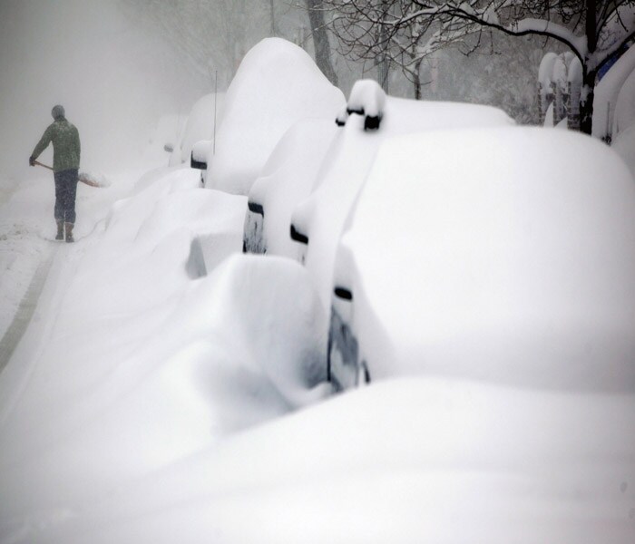 The storm, saved its worst for a late-day punch. It delivered a messy mix ? enchanting heavy snow in some places; menacing, invisible ice in others ? driven by relentless wind. (NYT Photo)