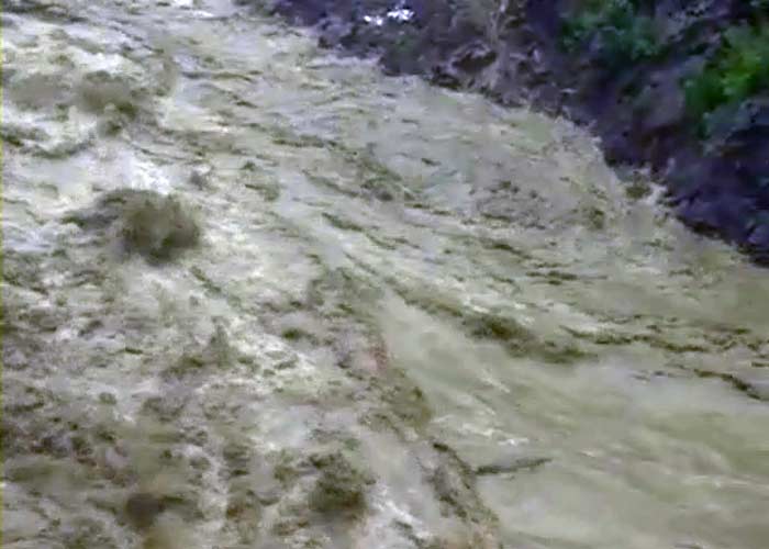 Heavy rainfall has caused rivers to swell dangerously