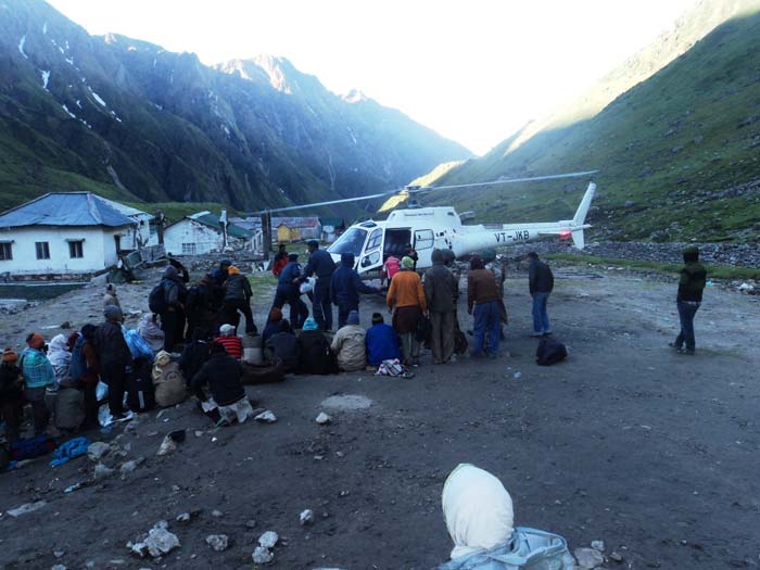 Despite rain and overcast skies today, military helicopters continued rescue operations in Uttarakhand today. 
<br><br>Image courtesy: NDRF<br><br>For more information, go to <a href="http://www.ndtv.com/sos" class="fbld fn fl ">www.ndtv.com/sos</a>