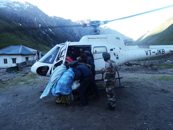 Nearly 90,000 people have been rescued in a heroic and vast rescue operation led by the military.
<br><br>Image courtesy: NDRF<br><br>For more information, go to <a href="http://www.ndtv.com/sos" class="fbld fn fl ">www.ndtv.com/sos</a>