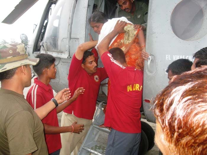 Four choppers made sorties to Badrinath today and evacuated 60 people, officials said.<br><br>Image courtesy: NDRF<br><br>For more information, go to <a href="http://www.ndtv.com/sos" class="fbld fn fl ">www.ndtv.com/sos</a>