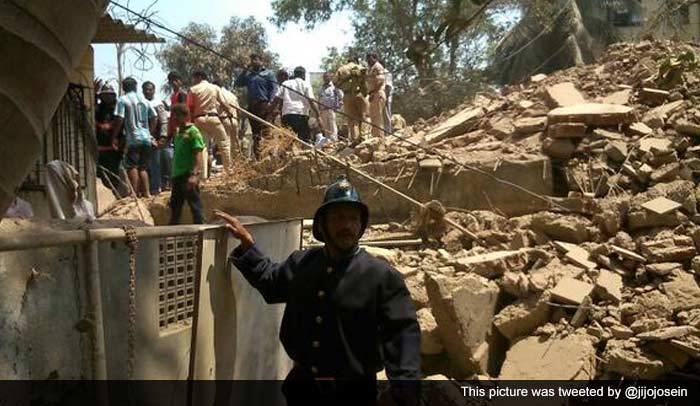 According to fire brigade personnel, the building, located in Yashwant Nagar near Grand Hyatt Hotel in Santa Cruz, came down around noon on an adjoining slum