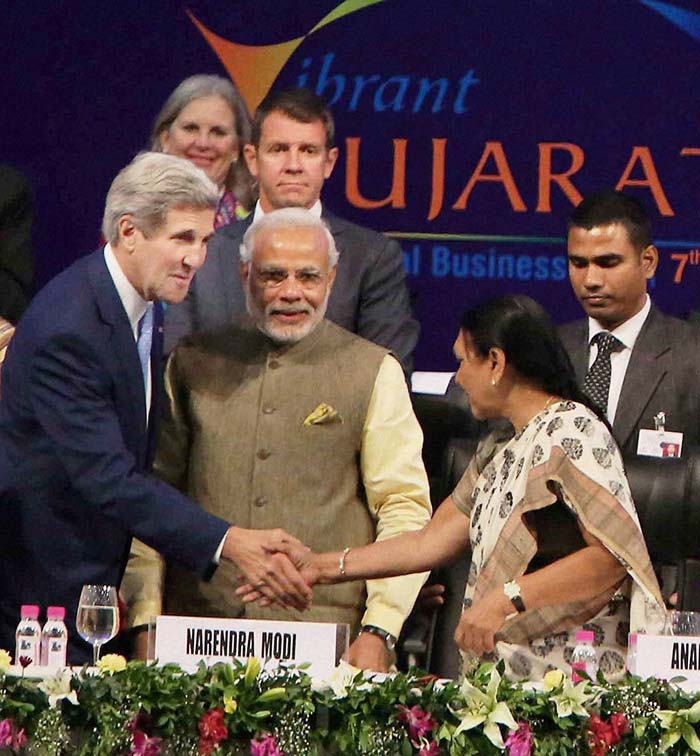 Prime Minister Narendra Modi with US Secretary of State John Kerry and Gujarat Chief Minister Anandiben Patel at Vibrant Gujarat Global Summit 2015 in Gandhinagar, Gujarat.
