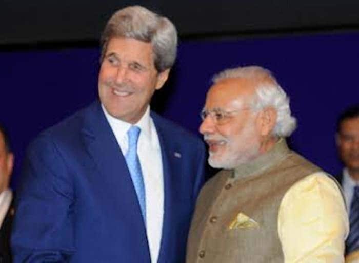 Prime Minister Narendra Modi with US Secretary of State John Kerry. (Photo Courtesy: PIB)