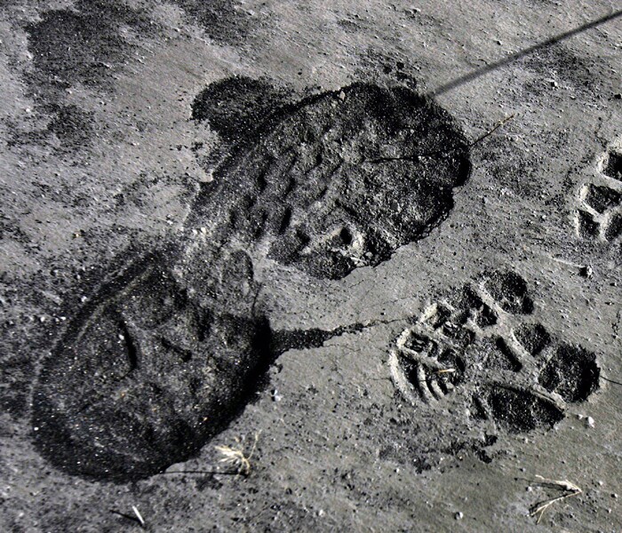 Footprints in volcanic ash fallen to ground near Myrdalssandur, some 220km east of the capital Rejkavik, Iceland. (AP Photo)