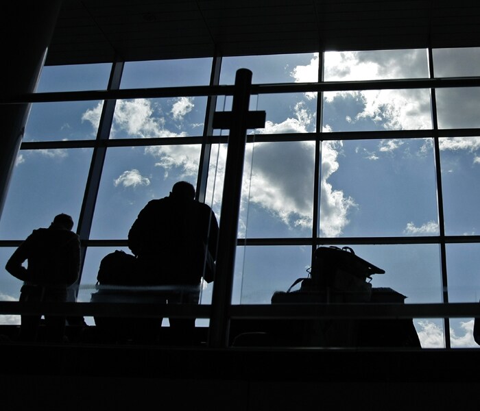 Passengers are seen at Domodedovo airport outside Moscow. A lingering volcanic ash plume forced extended no-fly restrictions over much of Europe, as Icelandic scientists warned that volcanic activity had increased and showed no sign of abating a portent of more travel chaos to come. (AP Photo)