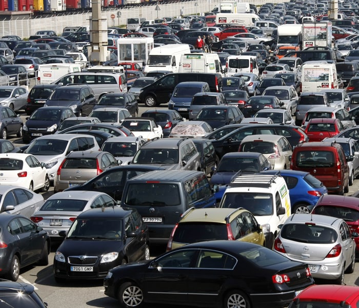 Cars wait at a departure point at the car ferry terminal in Calais, France. Many European countries suspended their air traffic due to ash clouds from the volcanic eruption in Iceland. Train operator Eurostar said it was carrying almost 50,000 passengers between London, Paris and Brussels. Thalys, a high-speed venture of the French, Belgian and German rail companies, was allowing passengers to buy tickets even if trains were fully booked. Ferry operators in Britain received a flurry of bookings from people desperate to cross the English Channel to France.(AP Photo)