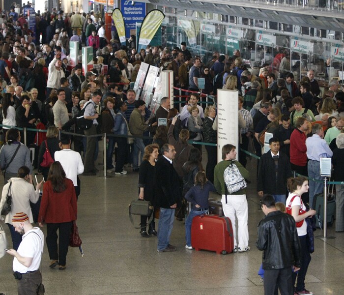 Passengers line up to buy train tickets at Rome's Termini station, on Sunday, April 18, 2010. Travelers crowded train stations as flights remained grounded in large parts of the continent, including northern Italy, as authorities across Europe said there was no end in sight to the plume spewing out of a volcano in Iceland. Millions of passengers have had plans foiled or delayed because of a ban on air travel that has gradually expanded over large swaths of Europe since Thursday. (AP Photo)