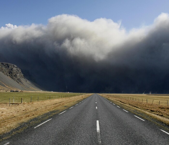 Volcanic ash seen over Iceland�s main ring road near Skogar, east of the eruption as the volcano in southern Iceland's Eyjafjallajokull glacier sends ash into the air. (AP Photo)