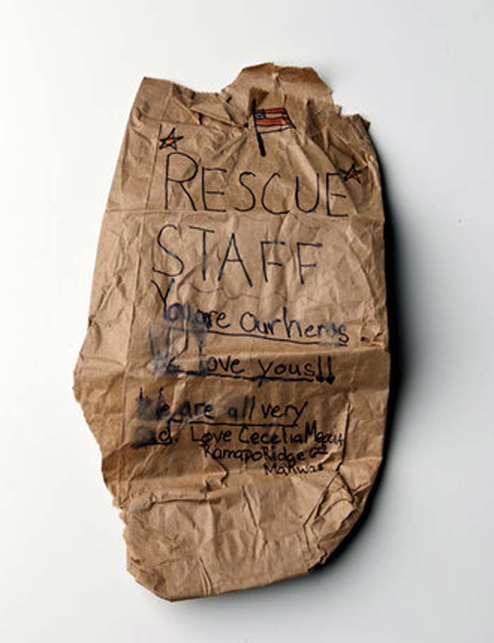 "This is the bag from a bag lunch given to me from a volunteer who was handing them out to rescue workers at the 9/11 site two days after the attack. It was prepared by an elementary student in New Jersey. I was working as a news photographer doing network TV live shots. I tried to decline it because I wasn't really a rescue worker and felt undeserving, but the volunteer insisted. It means a lot to me." -Mark Rast. <a href=" http://www.ndtv.com/article/world/9-11-memories-what-we-kept-132551" class="fg fn fl fs12">Read: 9/11 memories - What we kept</a><br><br>(Photo courtesy: Tony Cenicola, The New York Times)