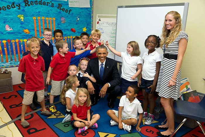 'Don't make rabbit ears', the US President said to students from elementary school at MacDill Air Force Base in Florida before taking a photo with them. </br>Photo Credit:</b> <a href=" http://www.whitehouse.gov/photos-and-video/2014-photos" rel="nofollow" target="_blank"><b>Pete Souza, Director and Chief Official White House Photographer</b></a>