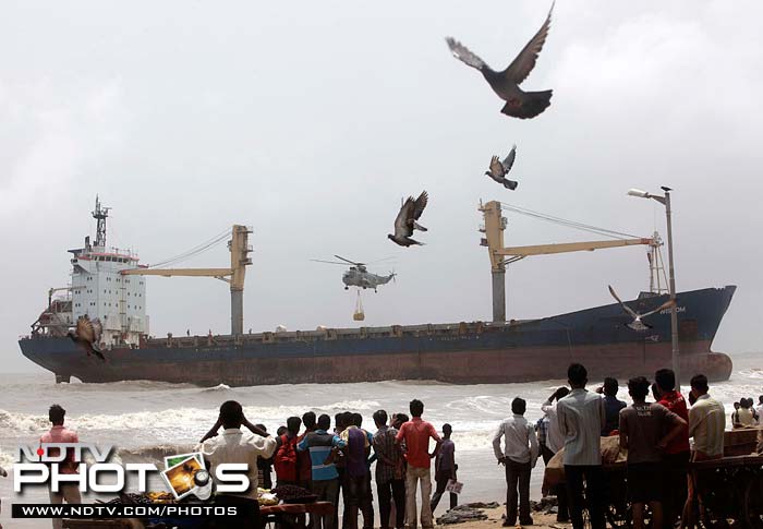 Navy attempts to salvage MV Wisdom from Juhu beach