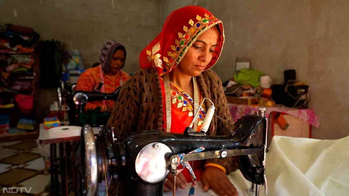 After losing her husband, homemaker Mamata struggled to make ends meet until she joined the USHA Silai School program. Today, her training and production center, equipped with 8 sewing machines, provides steady work for at least 10 women. Mamata's initiative has transformed her life and uplifted others, fostering a supportive community that contributes to the local economy.