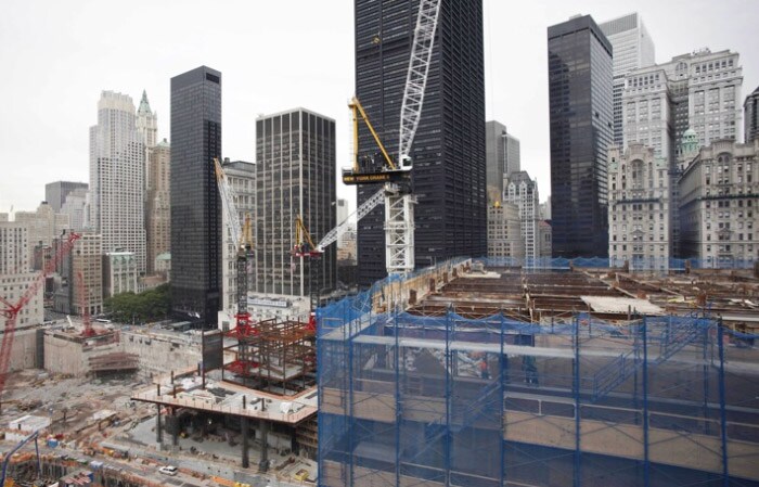 The World Trade Center construction site is shown, on June 9, 2010 in New York. At right is the former Deutsche Bank, heavily damaged in the attacks of September 11, 2001, and now being torn down. (AP Photo)