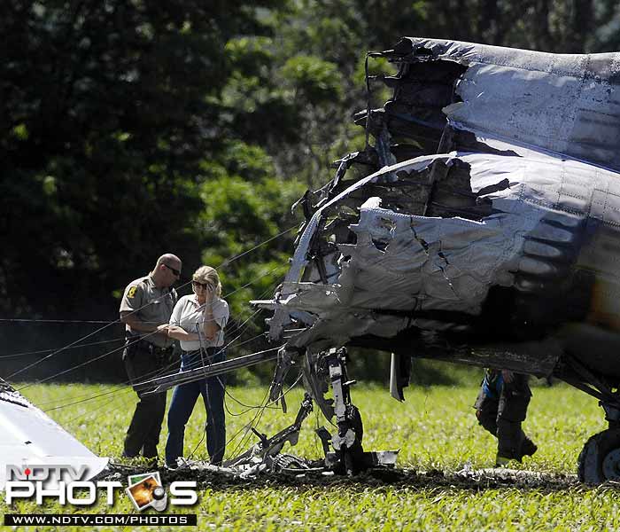 The pilot reported a fire shortly after taking off, Sugar Grove Fire Chief Marty Kunkle said.<br><br>"He attempted to make a return to the airport, but couldn't make it so he put it down in a corn field," Kunkel told the Chicago Sun-Times.<br><br>Firefighters from Oswego, Sugar Grove and Plainfield responded to the scene. Fire officials said they were having difficulty getting to the aircraft because of wet fields. (Photo courtesy: Associated Press)