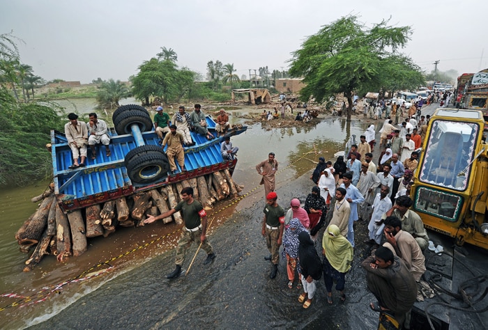 The 2010 Pakistan floods began in July 2010 following heavy monsoon rains in the Khyber Pakhtunkhwa, Sindh, Punjab and Balochistan regions of Pakistan. The devastating floods claimed over 2000 lives and affected a whopping 20 million people. <br><br>Officials estimated the total economic impact to be as much as 43 billion USD.<br><br>President Asif Ali Zardari was criticized for going ahead with visits to meet leaders in Britain and France at a time when his nation was facing perhaps its biggest catastrophe.