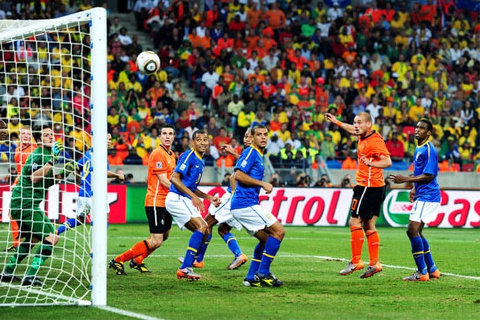 The first knock-out round though produced the expected results as most of the favourites advanced to the quarter-finals. The highlight of the round was Germany's 4-1 demolition of England in a match which saw an English goal disallowed by the referee.<br><br>Uruguay and Ghana met in the first quarter-final and Asamoah Gyan blew away a last minute chance from the penalty spot to make Ghana the first African nation to enter the World Cup semis. The ensuing shoot-out saw Uruguay win.<br><br>Spain too entered the semis with a clinical 1-0 win over the Paraguayans. But the biggest upset of the round was Netherland's 2-1 comeback win over favourites Brazil. An inspired performance from midfield dynamo Wesley Sneijder put the 'Oranje' through to the semis. Diego Maradona's World Cup dream also lay in tatters as Germany bulldozed them 4-0.