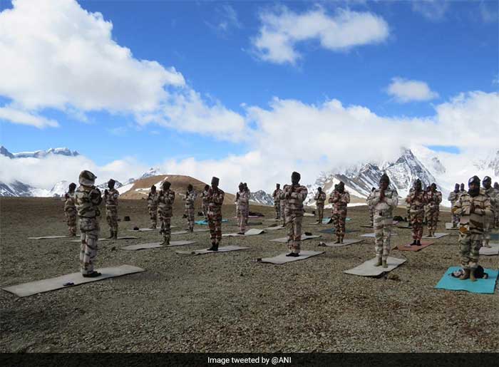 ITBP personnel perform yoga at an altitude of 19000 ft near OP Dorjila in Sikkim at minus 15 degrees Celsius temperature on  International Day of Yoga.