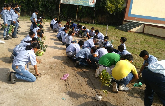 Seen here are students and teachers of Indirapuram Public School, Pratap Vihar, Ghaziabad, planting saplings in a vast area. Along with this activity to plant saplings, the students also conveyed a message that trees are jewels of nature and essence of life on Earth.