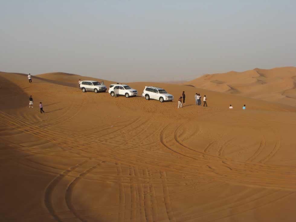 A lot of tourists were climbing on to what was going to be Dune bashing.