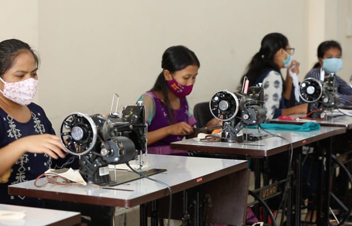 As part of the training and production centre model, the USHA Silai School programme brings its expertise of specialised training, customised to the needs of the partner, which could be anything from bags and uniforms to accessories, garments and so on. The training is then given at two levels - basic and advanced - depending on the skill of the learners.