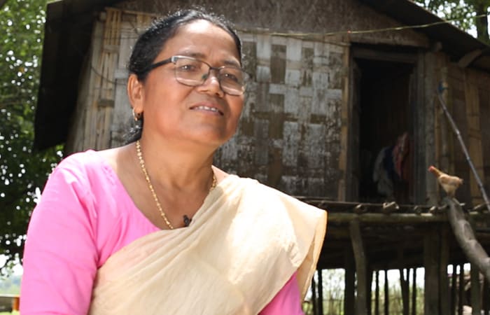 Diparani from Assam's Mising tribe, sustains her household by sewing and training other women & girls. On learning about USHA's Silai School Intervention in Majuli, she joined the training to enhance her income. Today she earns eight thousand rupees, and what brings her the most joy is watching her skills reach the village through her students.