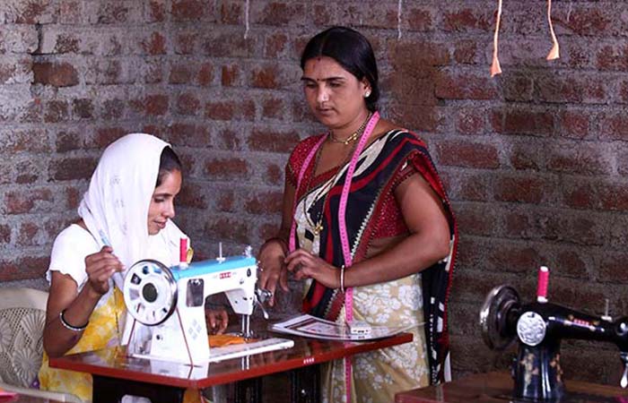 She stitches 7 to 8 women blouses everyday and earns arounf Rs 700 on an average from selling these.