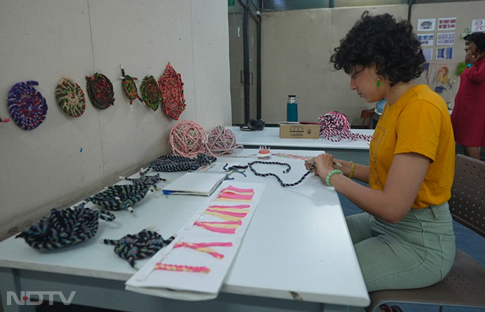 There is a uniqueness to each of the design projects, in the way the students approach the material and the method. For example, Isha Bapat, one of the students is using a fabric rope made from scraps which is essentially factory waste. She opted for a technique called coiling or basketry to make forms and structures with it.